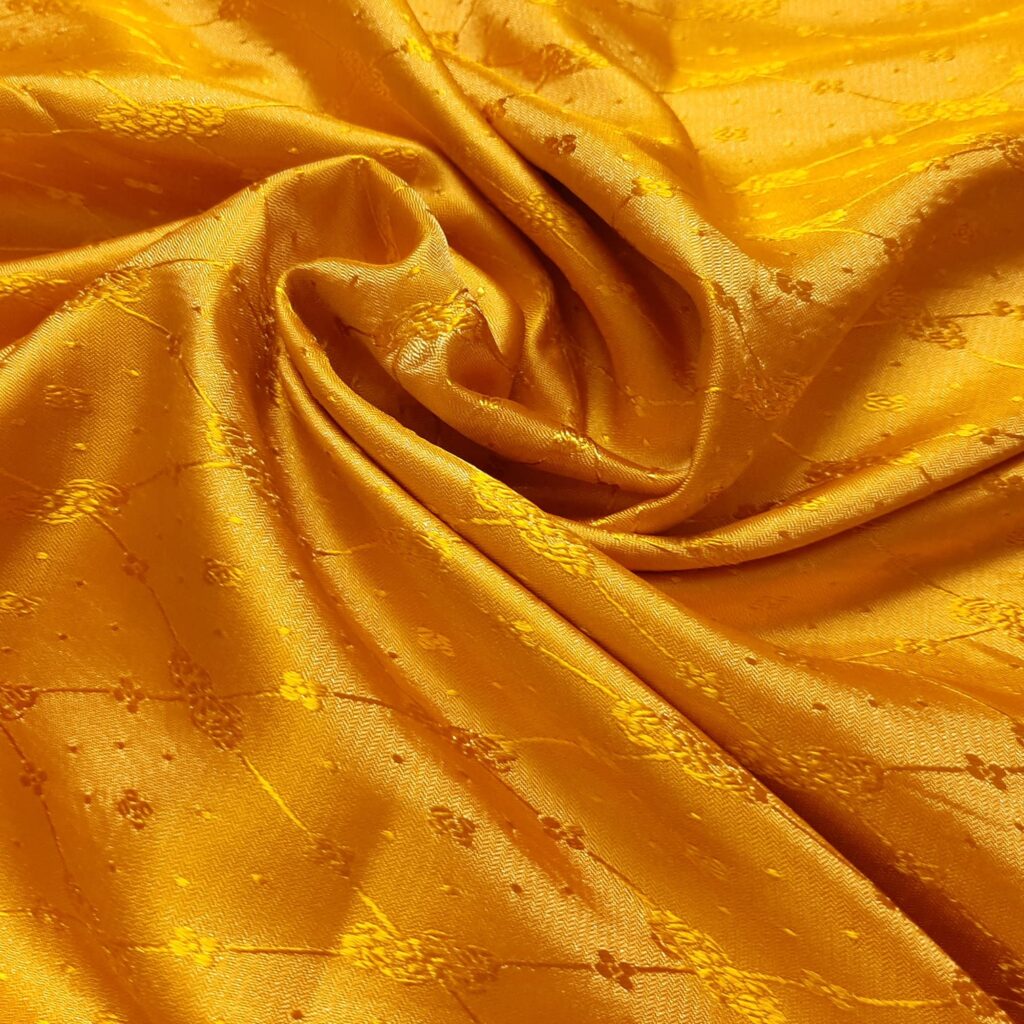 Golden yellow Banarasi brocade fabric for haldi outfit