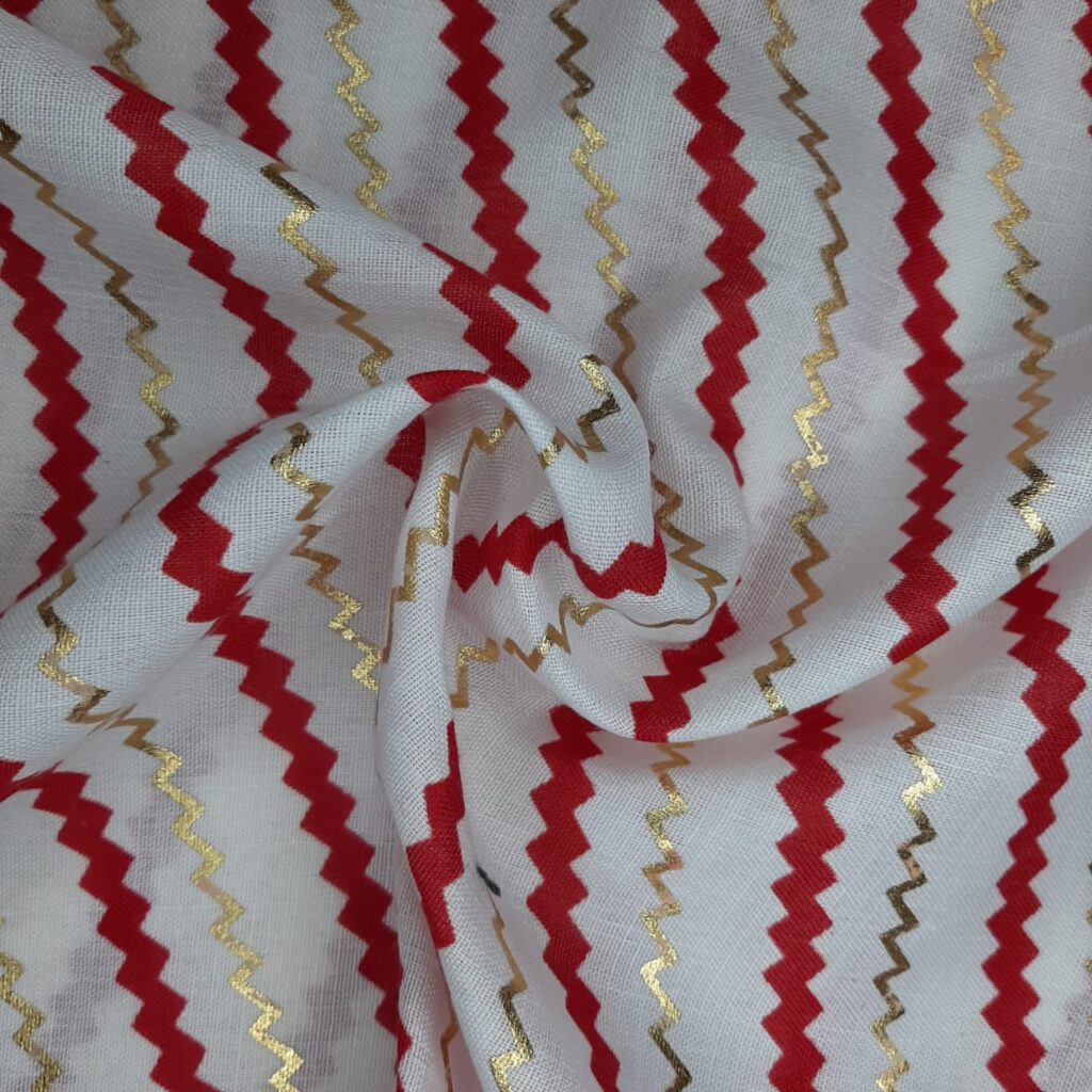 White cotton printed fabric with red and gold lines for kurtis